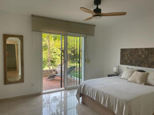 A bed or beds in a room at Casa Reserva Los Monteros