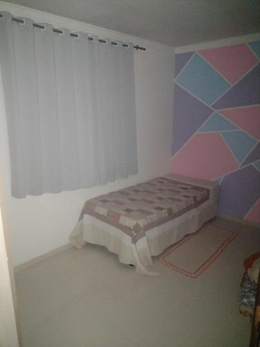 Postel nebo postele na pokoji v ubytování Alugo casa para Show Rural