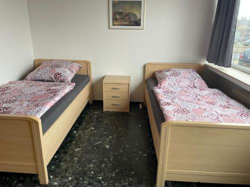 Ένα ή περισσότερα κρεβάτια σε δωμάτιο στο Zimmer Vermietung Hannover Pattensen