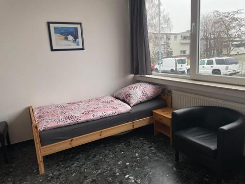 Ένα ή περισσότερα κρεβάτια σε δωμάτιο στο Zimmer Vermietung Hannover Pattensen