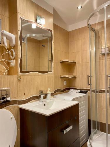 Ванная комната в HALBY rooms in the very CENTER of Warsaw