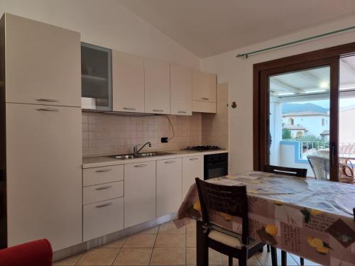 Η κουζίνα ή μικρή κουζίνα στο Residenze S'ABBAIDA - BUDONI SWEET HOME