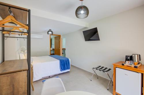 Postel nebo postele na pokoji v ubytování Filimahalo Hotel