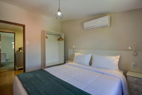 Postel nebo postele na pokoji v ubytování Filimahalo Hotel