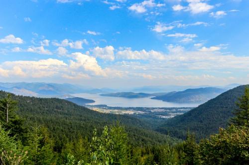a view of a valley with a lake in the distance at Sagle Sunrise in Sagle