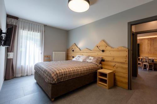 Ein Bett oder Betten in einem Zimmer der Unterkunft Bluebell Apartments