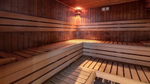a large wooden sauna with a wooden at Sándor Hotel in Pécs