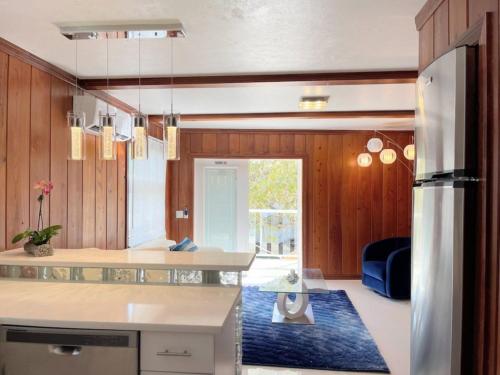 a kitchen with a counter top and a refrigerator at Nature View #3 in Fort Myers Beach
