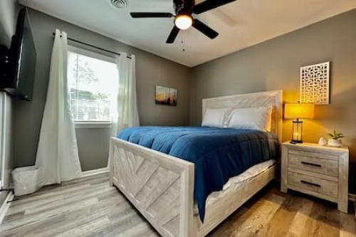 a bedroom with a bed and a ceiling fan at Sleek remodeled Design 2 Bed Trenton, OH Apartment in Trenton