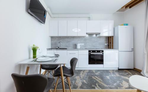 Η κουζίνα ή μικρή κουζίνα στο Nyvky Like Home - Nyvky Park - apt 45