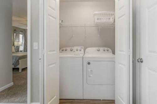 a white kitchen with a stove and a dishwasher at BRAND NEW Home away from Home among the Nook in Hamilton