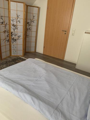 Postel nebo postele na pokoji v ubytování Gäste-Appartement-Kirsammer