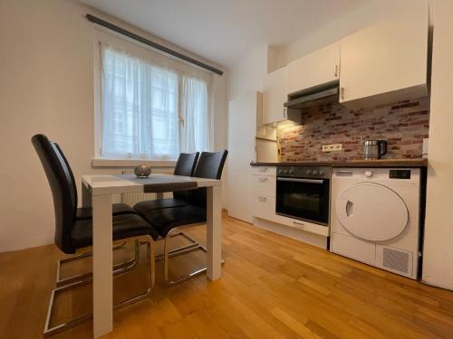 A cozinha ou cozinha compacta de Apartment Central Vienna