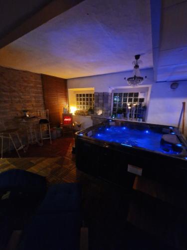 a large jacuzzi tub in a living room at Hotel New Bed in Oskarshamn