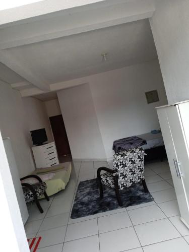 Una televisión o centro de entretenimiento en Flat Itavuvu