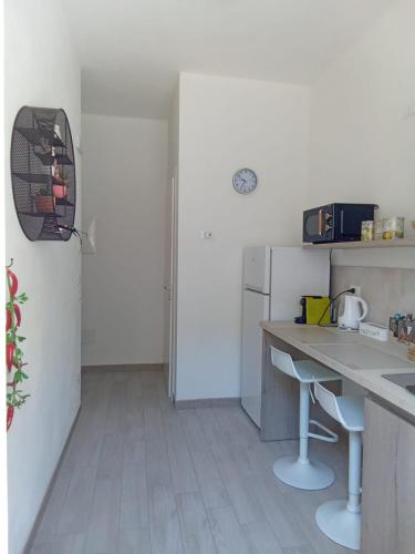 A kitchen or kitchenette at Appartamenti Milietta 1