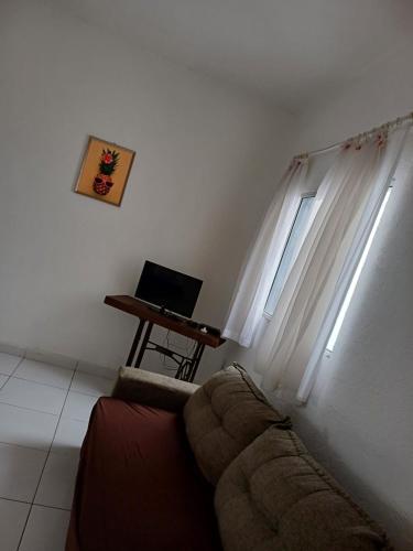 Una televisión o centro de entretenimiento en Flat Itavuvu