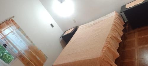 a bedroom with a large bed in a room at Cabañas Nicasio in Merlo