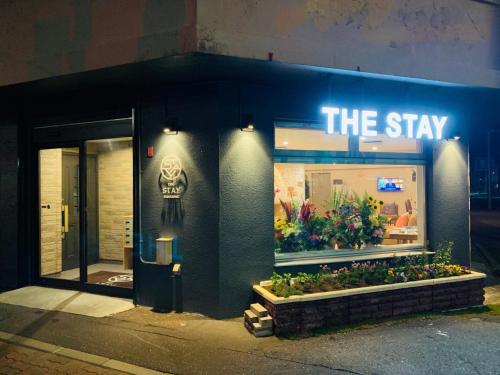 a store front with a sign that reads the stay at THE STAY WAKKANAI - Vacation STAY 40658v in Wakkanai