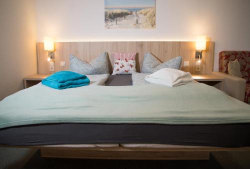 Ένα ή περισσότερα κρεβάτια σε δωμάτιο στο Hotel Villa Elisabeth