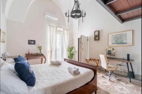 Ένα ή περισσότερα κρεβάτια σε δωμάτιο στο Nardò Glam - Family Suite and Rooftop