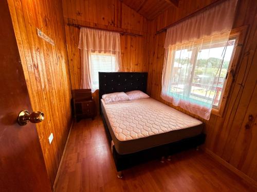 Postel nebo postele na pokoji v ubytování Cabaña Familiar 4p La Bertita