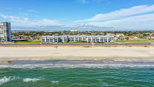 an aerial view of the beach and buildings at Baca Beach Escape II in Galveston