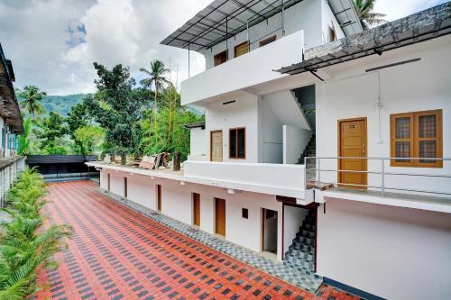 a view of the outside of a house at Flagship Thottunkal Building Thodupuzha in Neriyamangalam