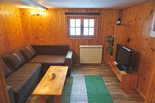Μια τηλεόραση ή/και κέντρο ψυχαγωγίας στο Guest House Montana