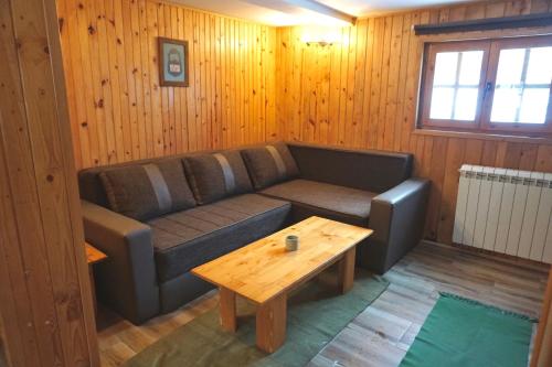 Χώρος καθιστικού στο Guest House Montana