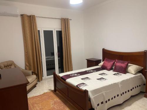 Ένα ή περισσότερα κρεβάτια σε δωμάτιο στο Miami Inn