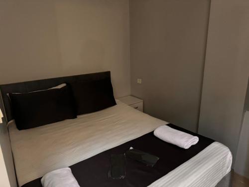 Ένα ή περισσότερα κρεβάτια σε δωμάτιο στο FORYOU SUİT OTEL