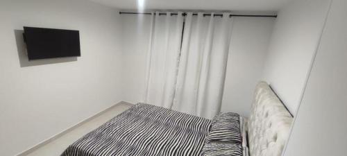 Postel nebo postele na pokoji v ubytování Privado y fascinante Apartaestudio San Alonso