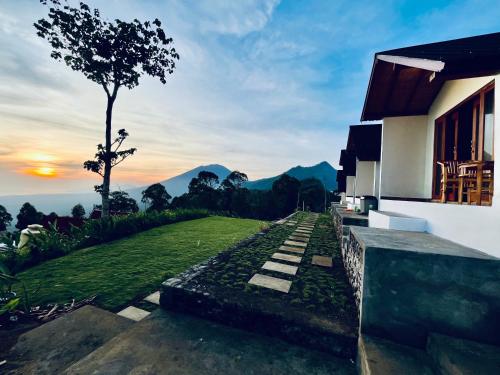 a house with a view of the mountains at Bali Sunrise Cabin in Bangli