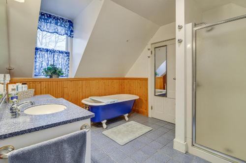 a bathroom with a tub and a sink and a shower at Charming Wilton Vacation Rental with Fire Pit in Wilton