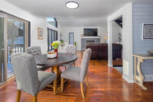 a dining room with a table and chairs at Green Bay Cozy home, 3 bed rooms, 6 beds, 2 bath in Green Bay