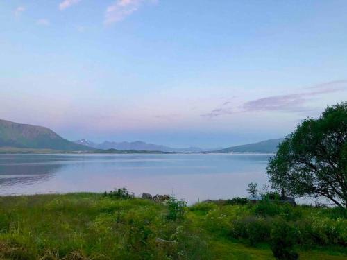 a view of a large body of water at House by the Sea in Sortland