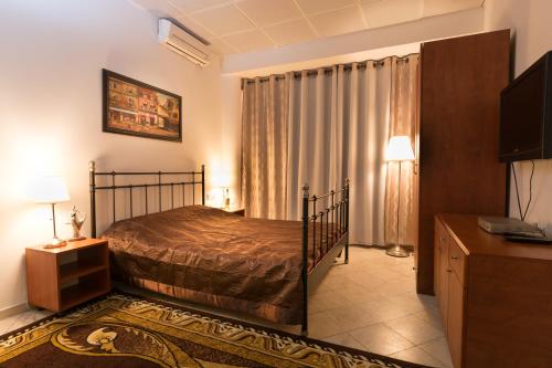 Postel nebo postele na pokoji v ubytování Hotel Rothschild 37