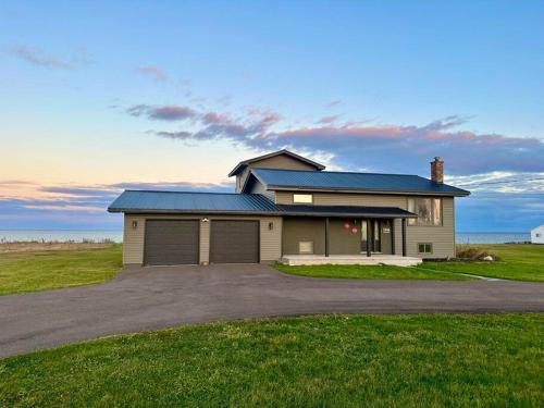 Executive Waterfront Home in Grande Digue