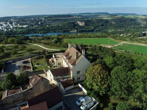 an aerial view of a large house with a yard at La Bonbonniere - Sure Hotel Collection by Best Western in Dijon