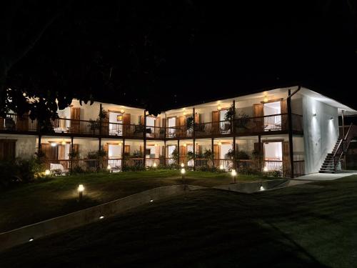 a large building at night with lights on it at Finca del Café - Casa Bourbon in Santa Rosa de Cabal