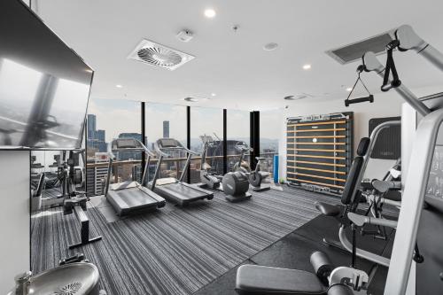 a gym on the floor of a building at Queen St Residence in Brisbane