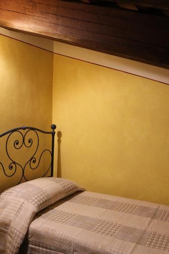 Postel nebo postele na pokoji v ubytování Agriturismo Casale La Palombara
