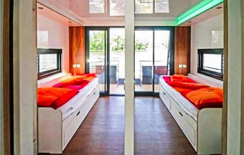 Voodi või voodid majutusasutuse 2 Bedroom Nice Ship In Havelsee Ot Ktzkow toas