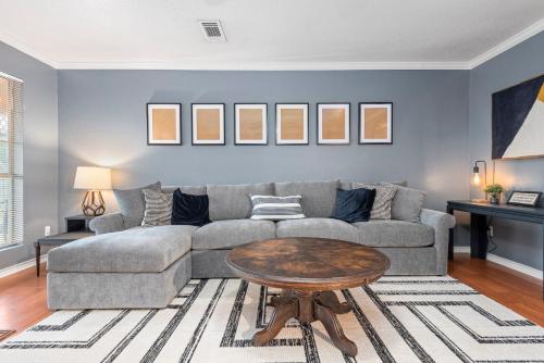 a living room with a couch and a table at Sunnyside Retreat in Bacliff