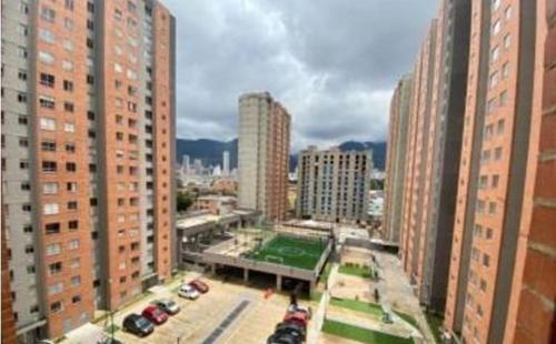 an aerial view of a city with tall buildings at Apartamento zona central - paloquemao in Bogotá
