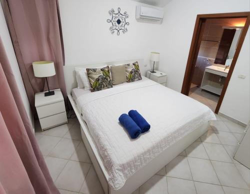 Ένα ή περισσότερα κρεβάτια σε δωμάτιο στο Sol Caribbean Beach Corales