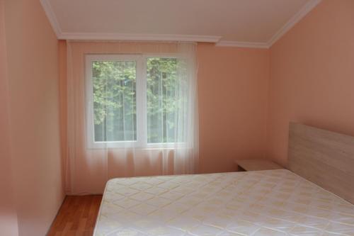 Ένα ή περισσότερα κρεβάτια σε δωμάτιο στο Konstantin House