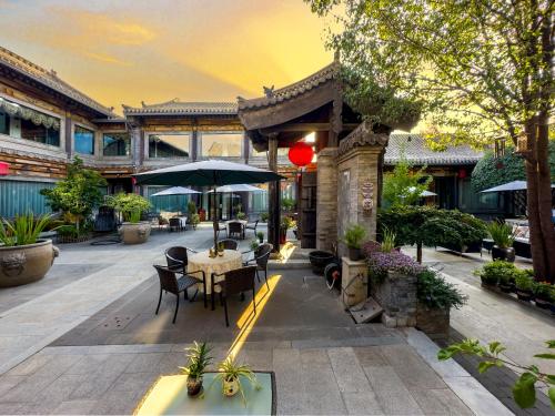 Restaurant o un lloc per menjar a Datong Yunzhong Traditional Courtyard