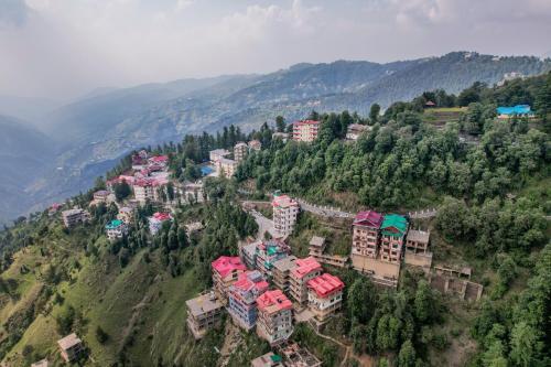 an aerial view of a resort on a mountain at Saanjh - The Musical Sunset in Shimla